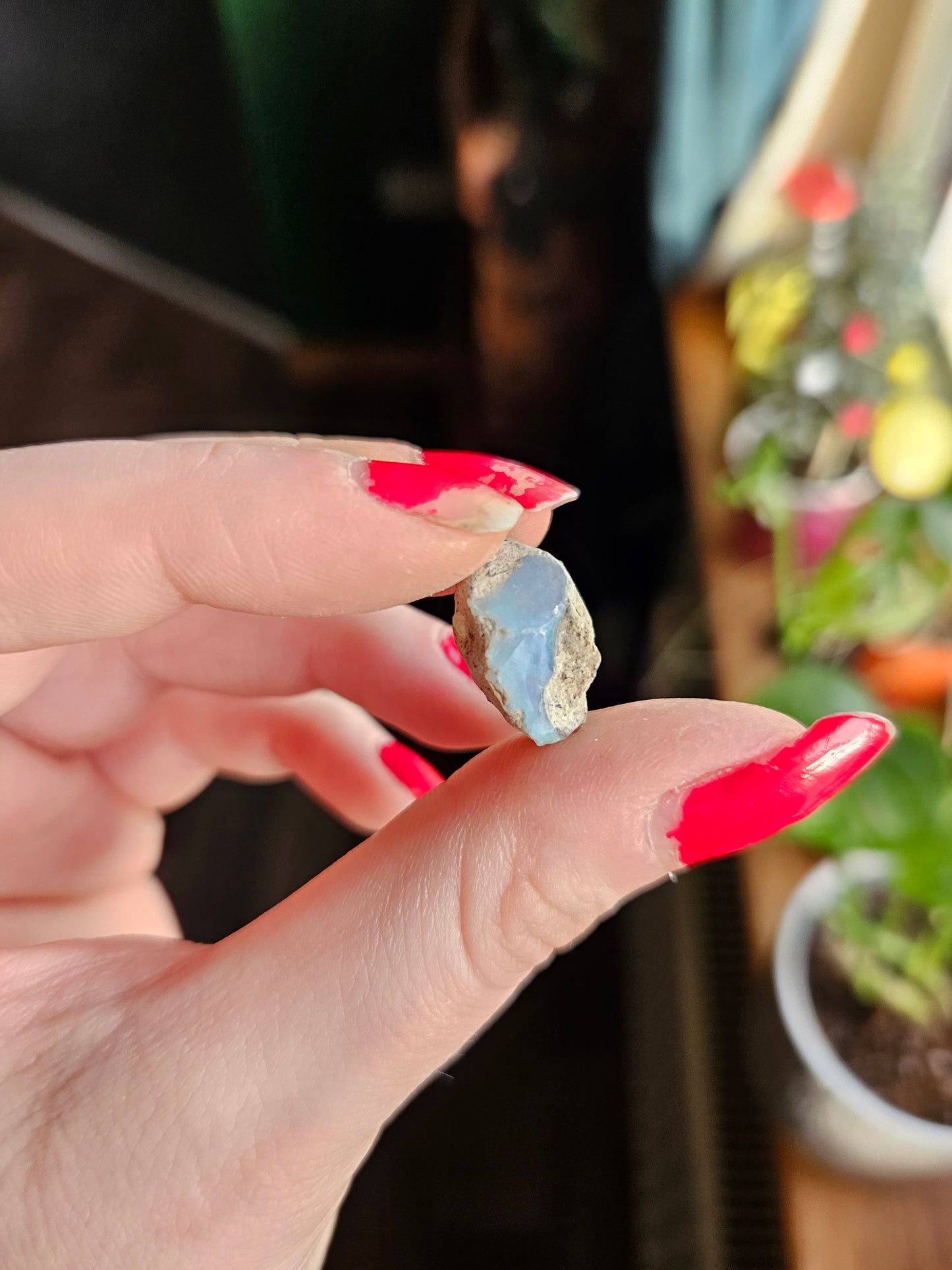Ethiopian Opal in display case - B