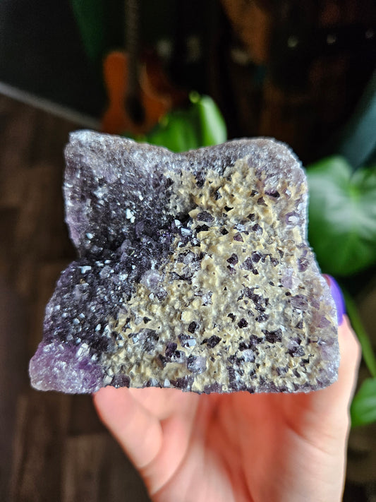 Amethyst with Hematite flakes
